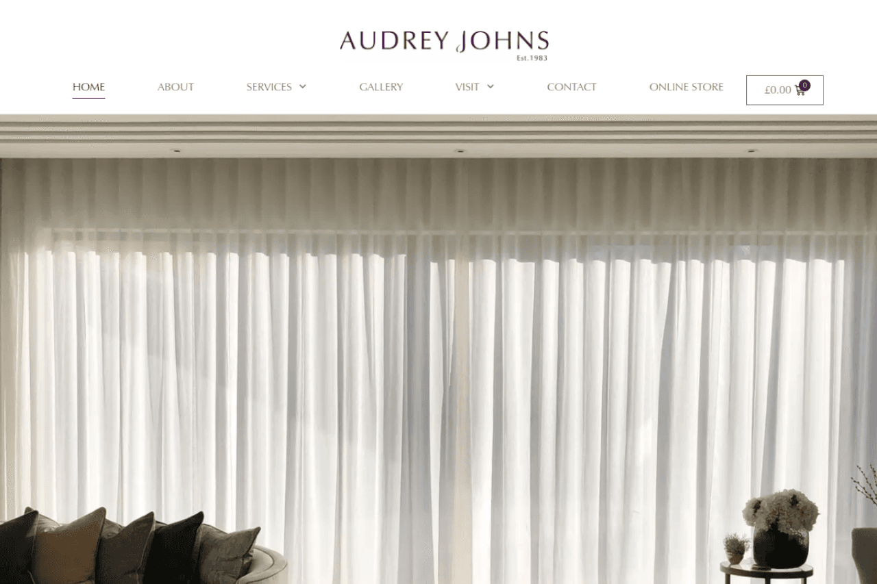 Homepage of audrey-johns.co.uk showing bespoke soft furnishings branding